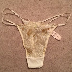 NWT Victoria Secret cream lace thong with gold, Sm